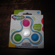 Push and Pop Fidgetz Spinner. New.