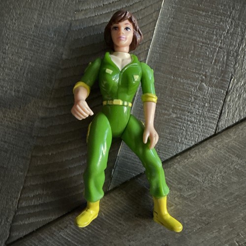 Figura Newsvan 1988 Playmates TMNT April O'Neil (mono verde) Canal 6