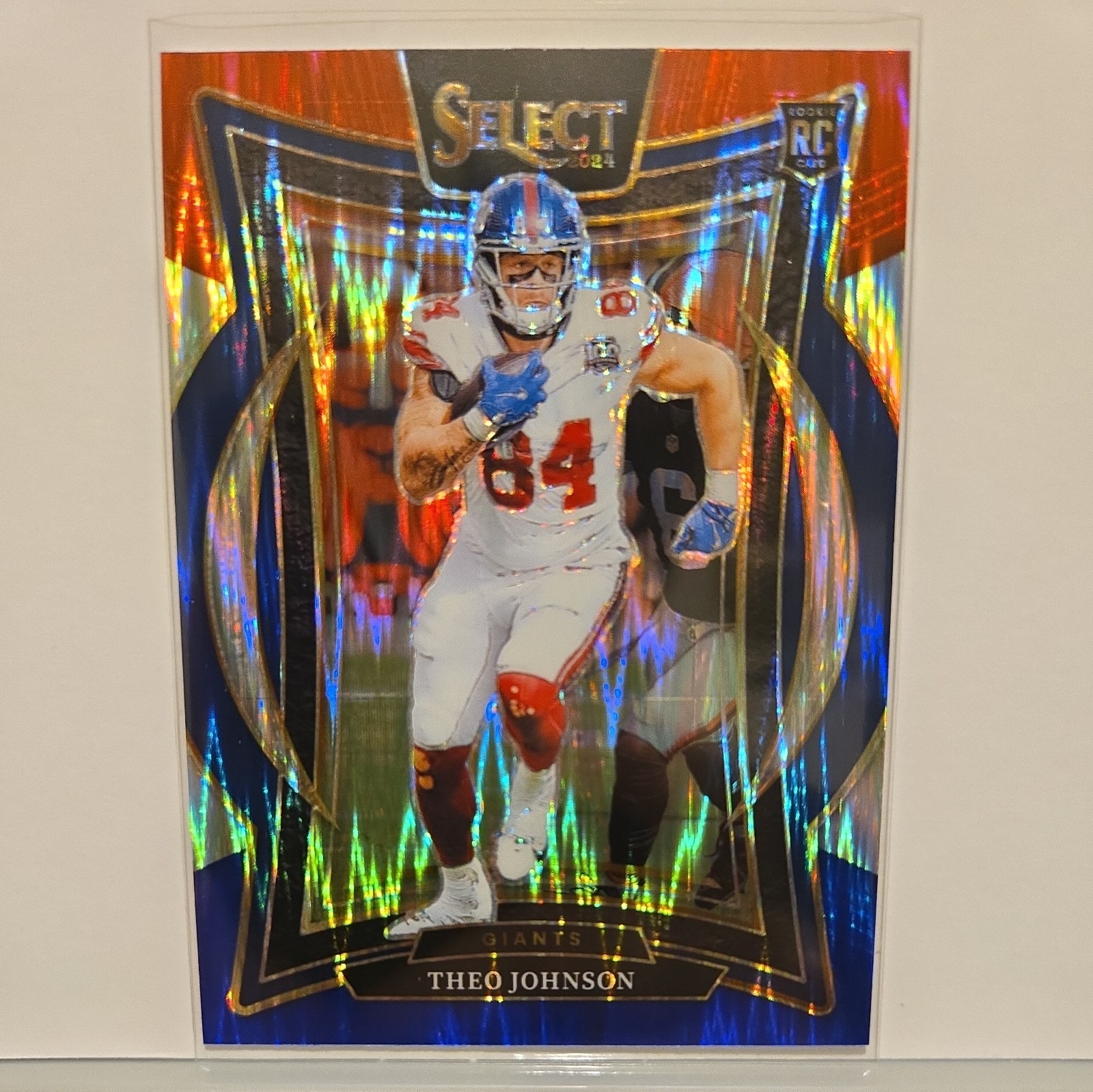 Theo Johnson Panini Select #96 Red & Blue Shock