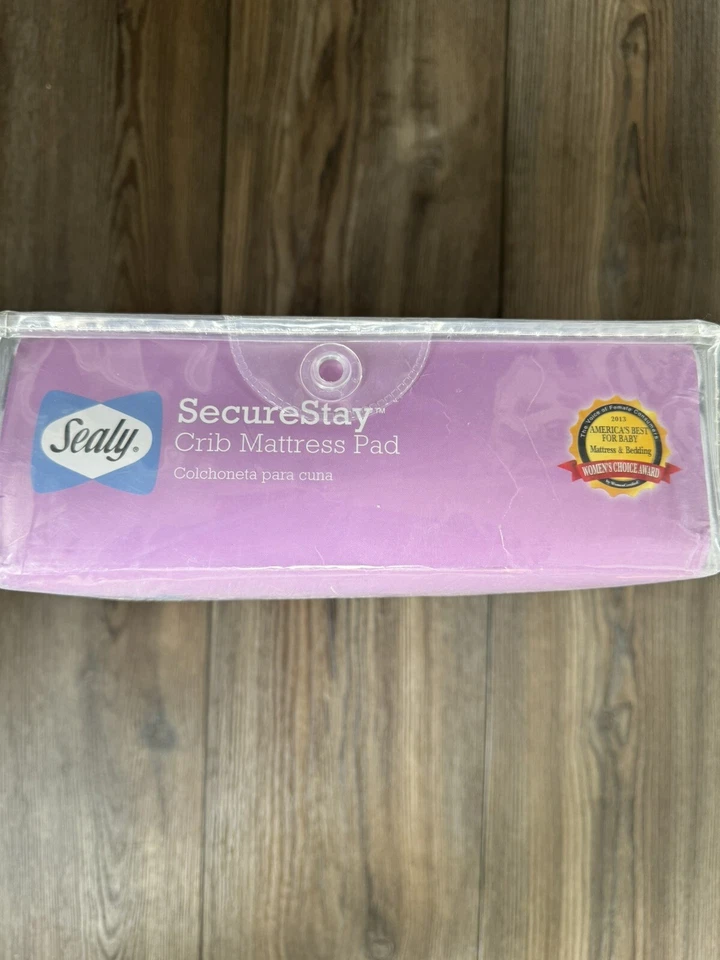 Almohadilla de colchón para cuna Sealy Secure Stay impermeable blanca 52" x 28" Foto 3 de 3