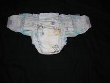 I have 2 sample Luvs size 7 with double tabs 0ver 41 Lbs will fit 32 in waist