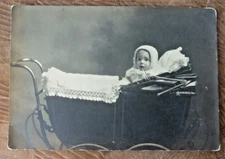 Photograph of Baby In Pram 1910 era