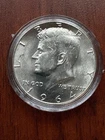 1964 Kennedy Half Dollar Uncirculated 90% Silver in Capsule Nice Luster
