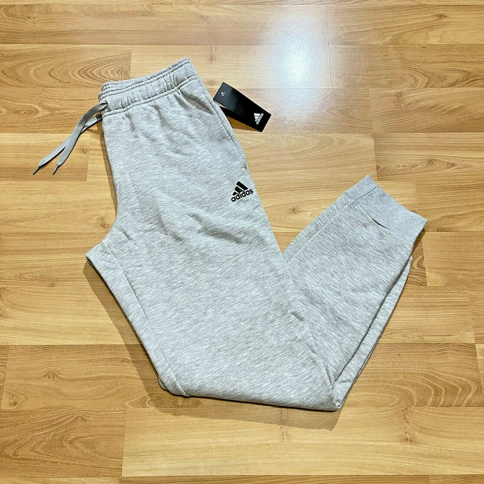 Зауженные брюки для бега трусцой adidas ADV Essential размера XL серые тренировочные гольфы 9590₽