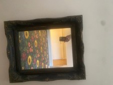 Black victorian style metal framed mirror