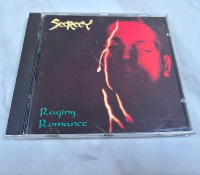 SECRECY-RAGING ROMANCE. 13 TRACK ORIGINAL NOISE CD.  1991.  UNPLAYED.