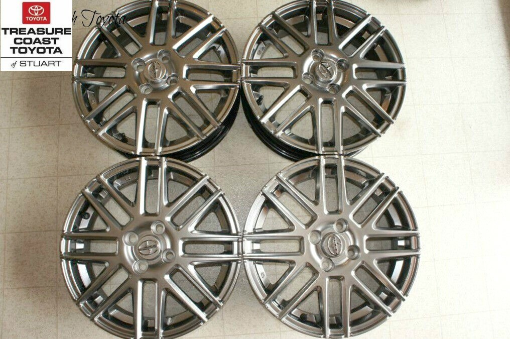 NEW OEM SCION iQ 16 INCH 8-SPOKE ALLOY WHEELS & CENTER CAPS NEW OEM SCION iQ 16 INCH 8-SPOKE ALLOY WHEELS & CENTER CAPS