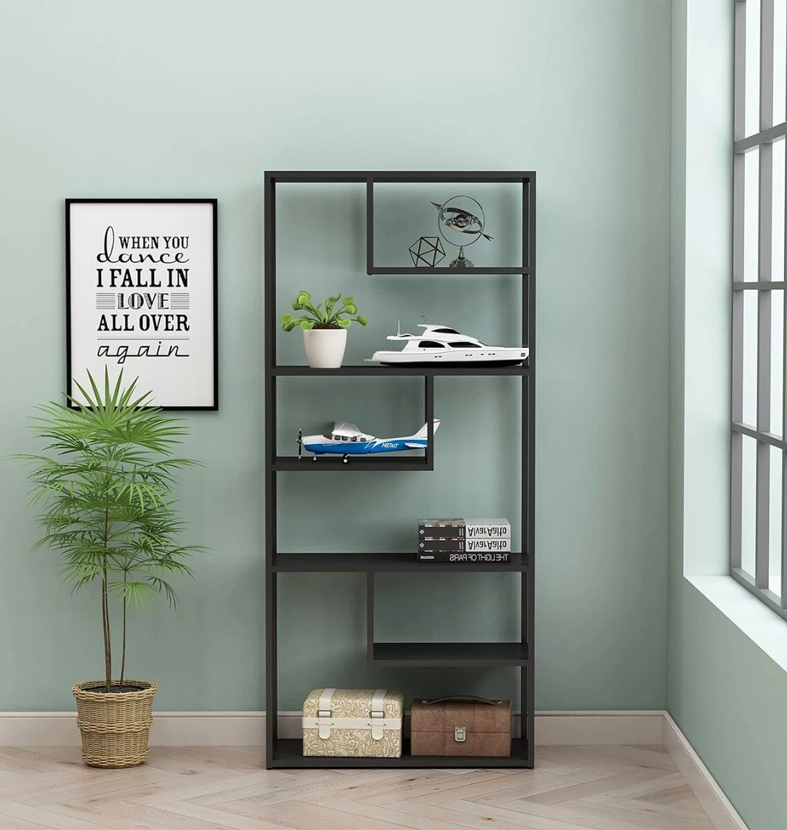 Black bookshelf with storage outlet