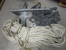Lewmar claw anchor, 50 ft anchor chain and 280 ft rode. Like new.
