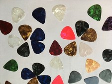 12 pack of light/med  .71mm Picks assorted Colors Sale Bakers doz