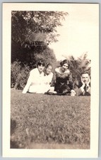 Vtg B&W Snapshot Four Friends Relaxing On Grass Lawn Garden 1920s