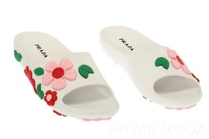 white flower flip flops