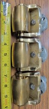 Grand piano brass casters recently polished