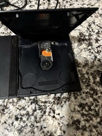 PlayStation 2 slim black console tested and working with cords and controller