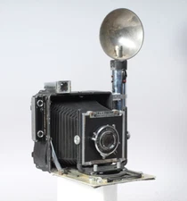 BURKE & JAMES 4X5 PRESS CAMERA W 135MM F/4.7 WOLLENSAK LENS & FLASH GUN
