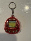 Tiger Giga Pets Baby T-Rex Virtual Pet Digital Keychain Toy — photo 2