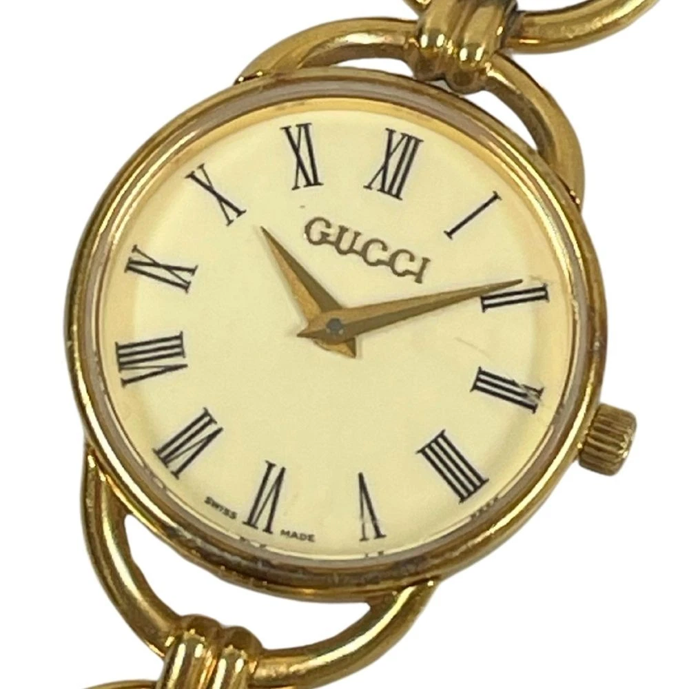Montre Gucci Reasonable 6000.2.L 2 aiguilles cadran ivoire Qz or / C20 occasion