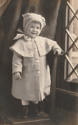 Vintage Postcard Photo Cute girl wearing a coat and hat smiling for a photo