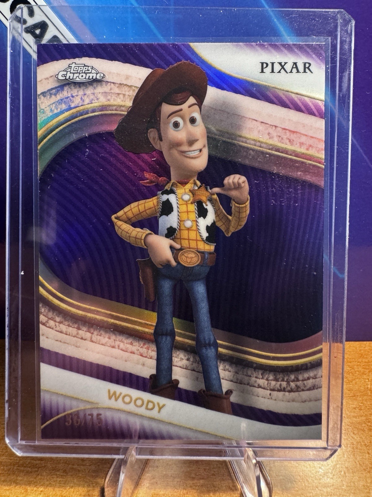 Woody 2025 Topps Chrome Disney #89 Purple Wave Refractor /75 Price