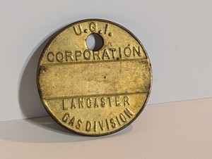VINTAGE COLLECTIBLE GAS BRASS TAG U.G.I. CORPORATION LANCASTER GAS DIVISION