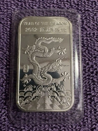2012 APMEX Year of the Dragon 1 Troy Ounce .999 Fine Solid Silver Bar