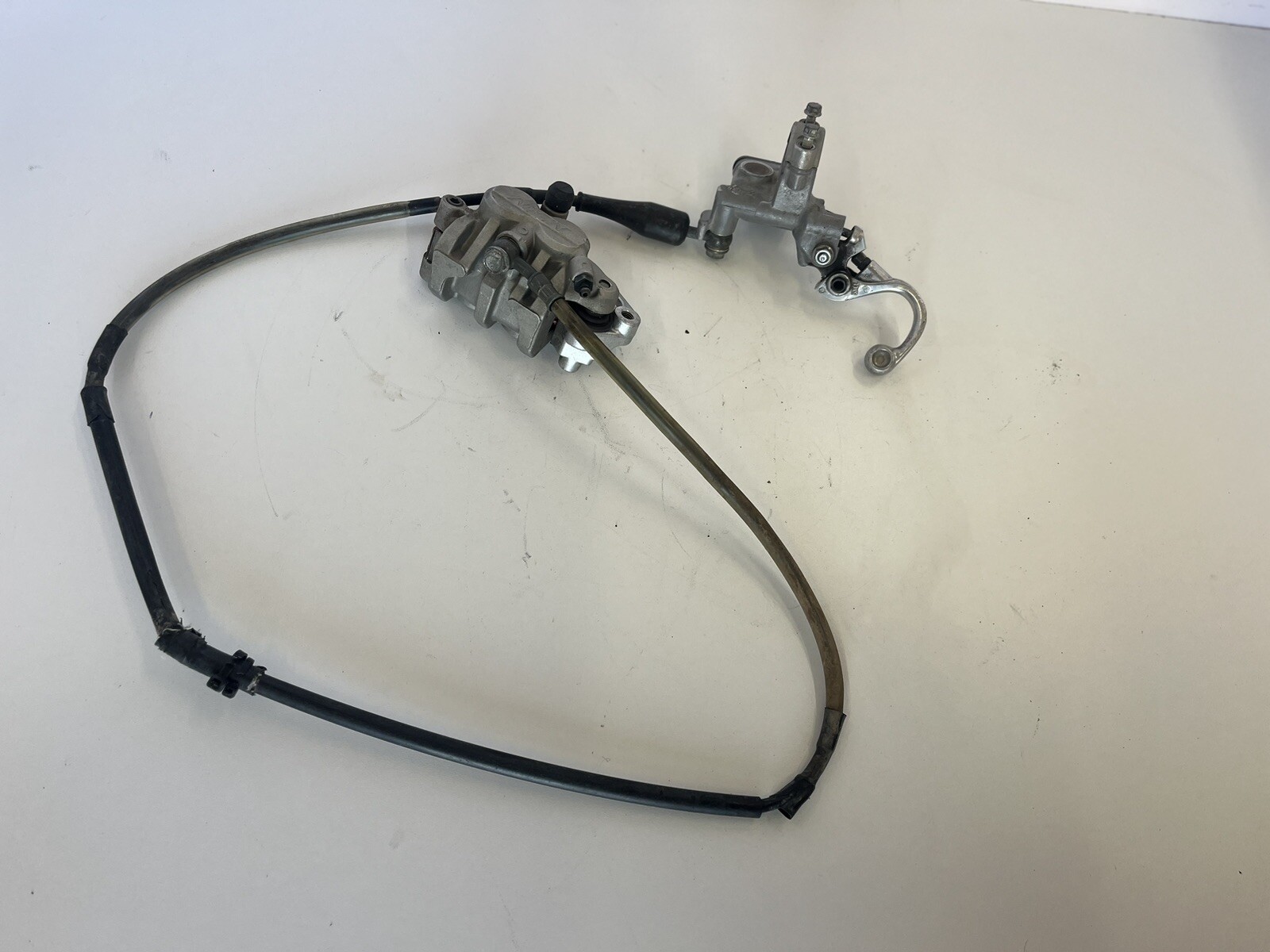 2004 Kawasaki KX250F Front Brake Assembly with Master Cylinder Caliper and Lever