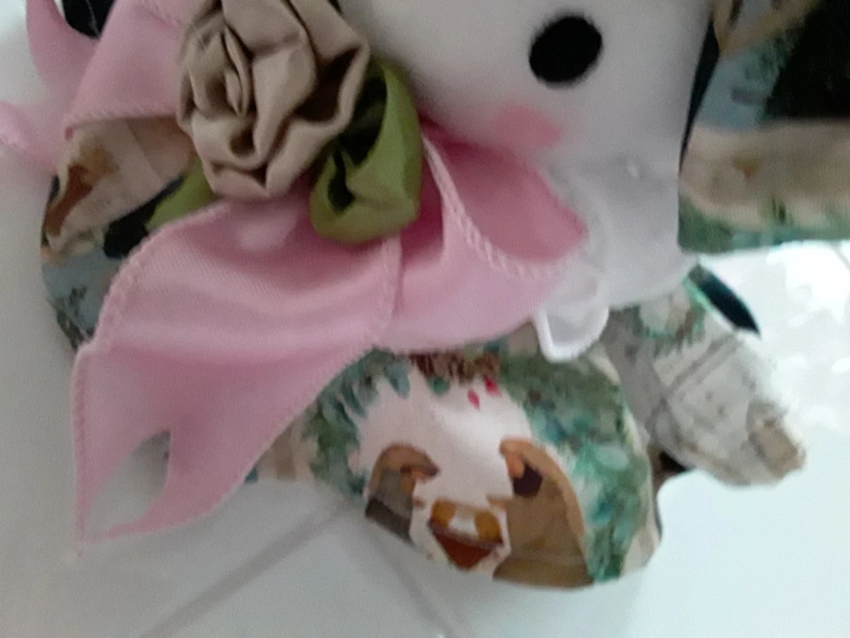 NATIVIDAD DE NAVIDAD O NOCHE SANTA VESTIDO HELLO KITTY CON CORAZÓN ORNIE Y CARAMELOS Foto 2 de 4