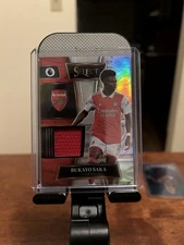 Bukayo Saka 2022-23 Panini Select Silver Prizm Swatch Patch #SW-BSA