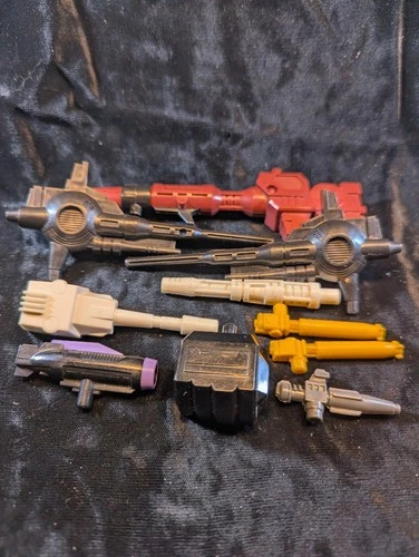Vintage Transformers G1 Weapon Parts & Accessories - Lot of 10 valued @ $140.00.