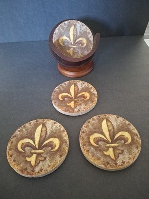 Thirstystones Fluer De Lys Pre-owned set of coasters complete with wooden holder
