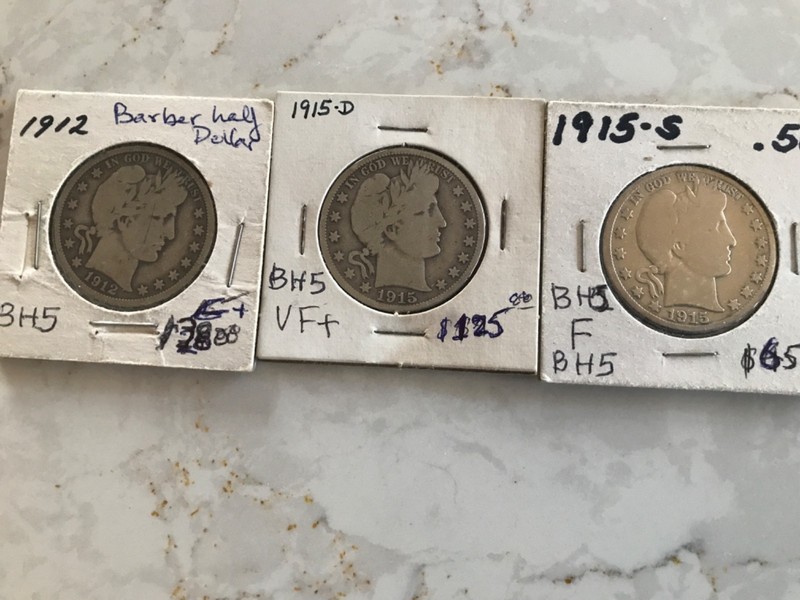 A LOT OF THREE BARBER SILVER HALF DOLLAR.The DATES ARE:1912,1915D,1915S
