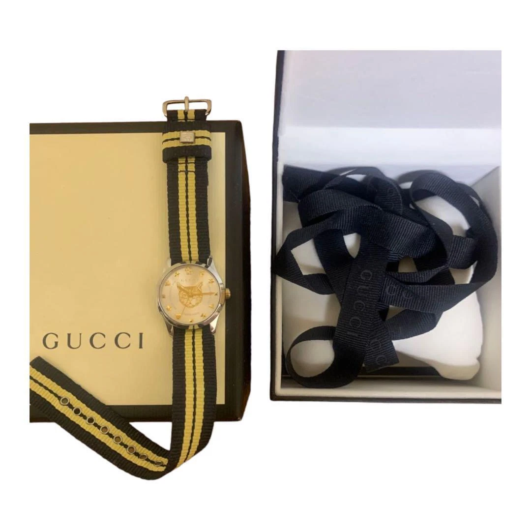 Gucci top belt watch