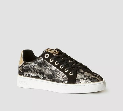 guess black and gold trainers