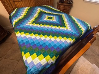 Over King Size Machine Pieced And quilted Patchwork Quilt one left