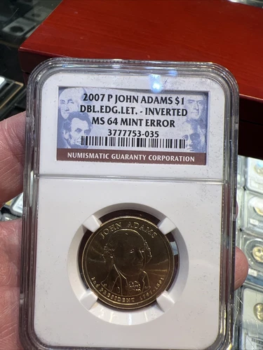 2007-P JOHN ADAMS $1 DOUBLE EDGE LETTERING, INVERTED, NGC MS64 MINT ERROR