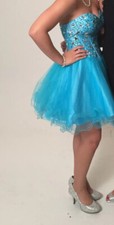 blue homecoming dress Size 4 WORN ONCE IN GREAT CONDITION BOUGHT FOR 350 