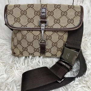 Sac Gucci Gg toile Jackie taille body marron