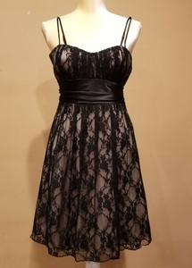 black lace dress with gold underlay