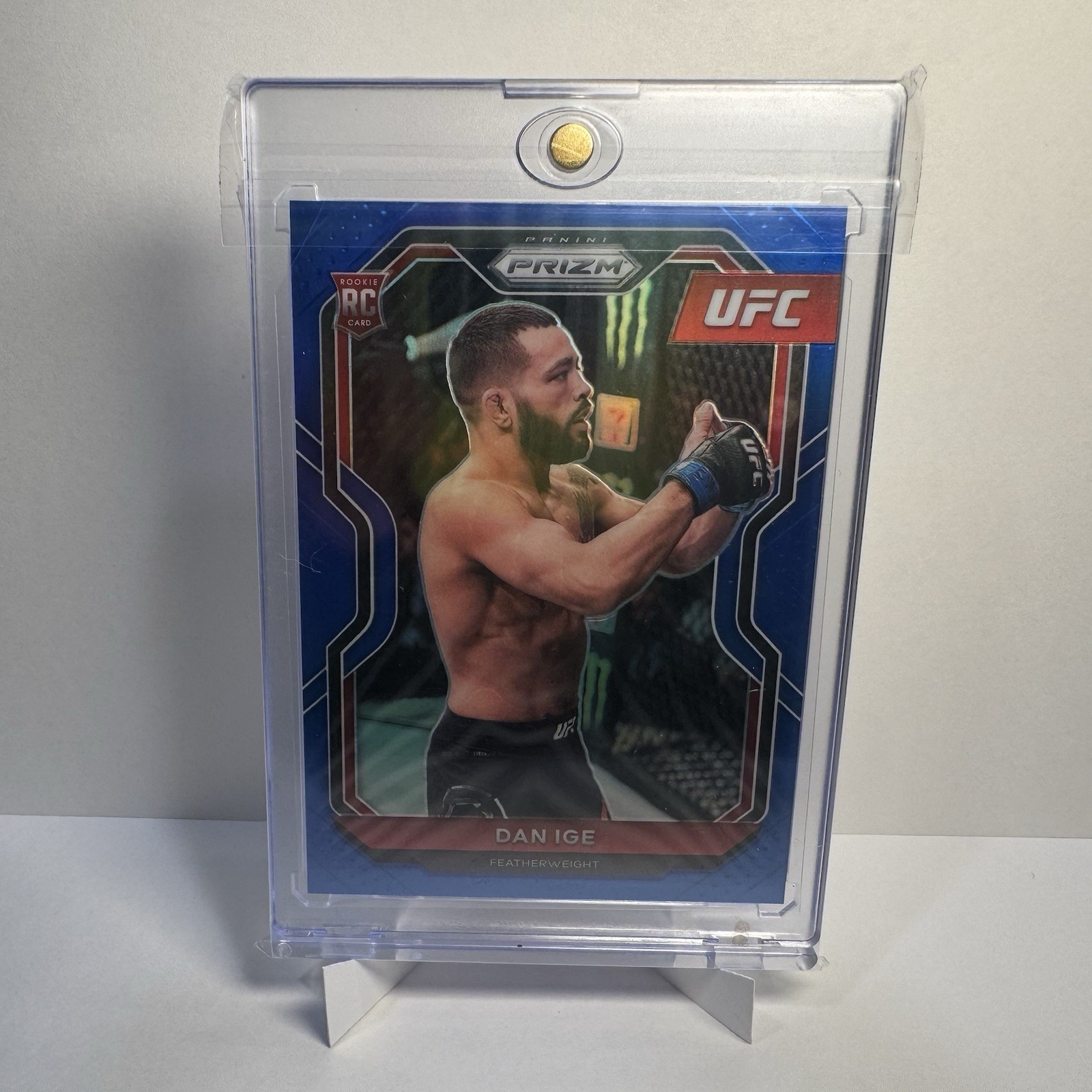 2021 Panini Prizm UFC Dan Ige Blue Prizm No. 70 RC 31/199