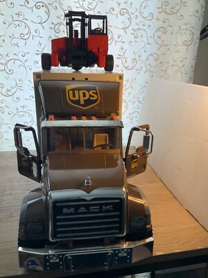 Bruder Toys 02828 MACK Granite UPS Logistics Truck WITH Forklift