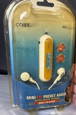Coby CX61 mini FM Pocket Radio w/ Neck Strap/Ear Buds  New Read