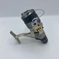 Molinete Shimano Exage 10000 Fc, color plateado, lado de la manivela