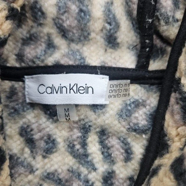 Chaqueta con capucha y cremallera con estampado de leopardo talla mediana de Calvin Klein para mujer Foto 3 de 4