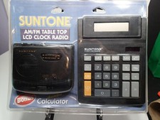 Vintage 1997 Suntone AM/FM LCD clock radio with bonus calculator still sealed up