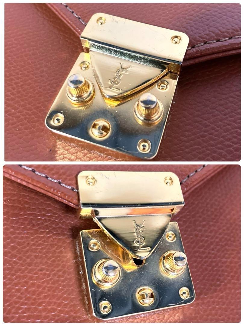 Borsa pochette uomo Yves Saint Laurent pelle cammello fodera logo oro ferramenta chiave