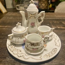 Vintage Miniature Porcelain Tea Set with Gold Trim and Rose Motif 9 Pieces