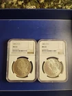 Lot Of 2 1885-O $1 Morgan Silver Dollar toned & Frosty NGC MS63