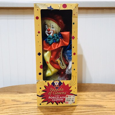 small porcelain clown dolls