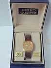 Vintage Mens Seiko SQ 7813-5059 Gold Tone Quartz Day Date Watch RUNS GREAT Read