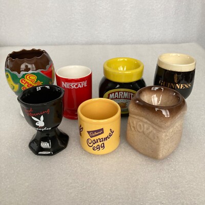 Konvolut 7 Werbe Eierbecher - Cadbury, Marmite, Hovis etc.